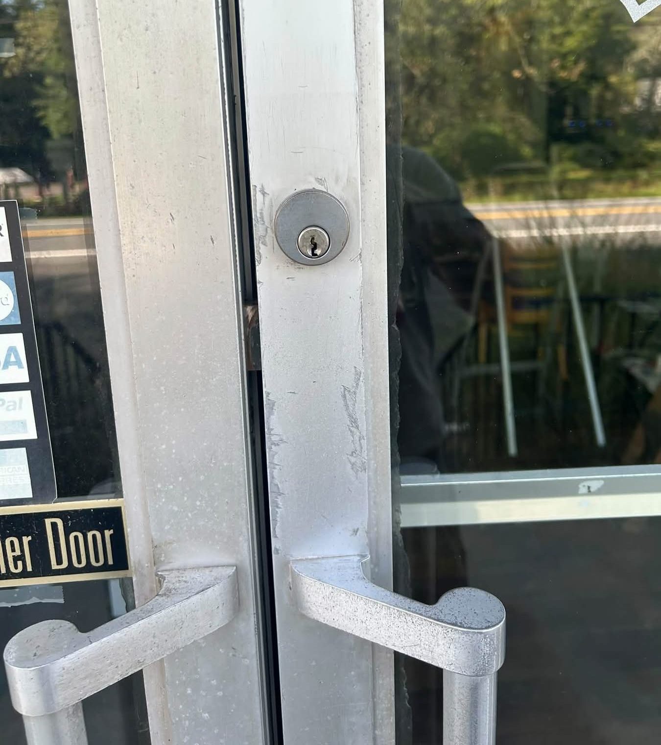 worn front doors of first place cafe